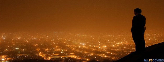 man overlooking city